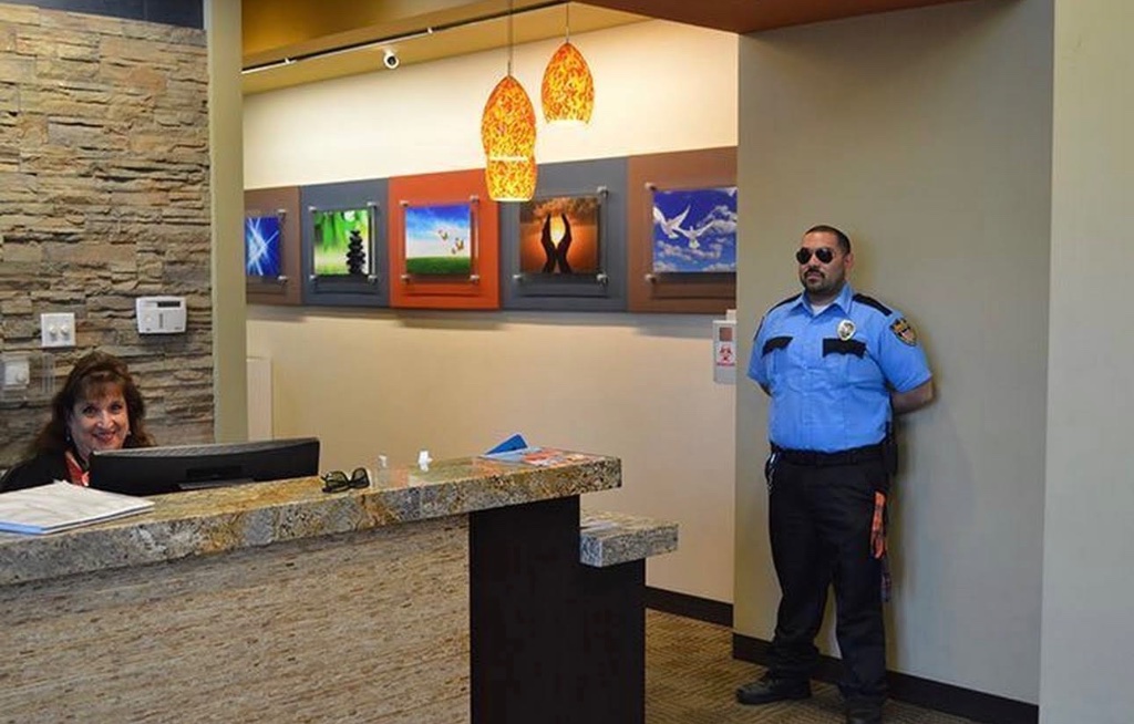 Security officer standing in a hotel lobby